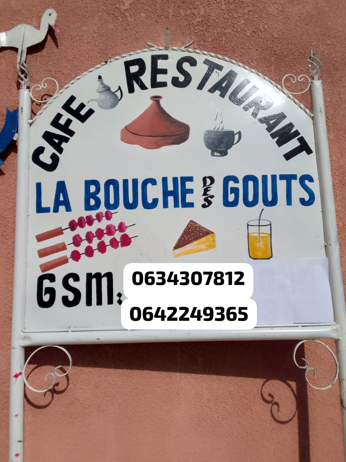 Enseigne restaurant peinte